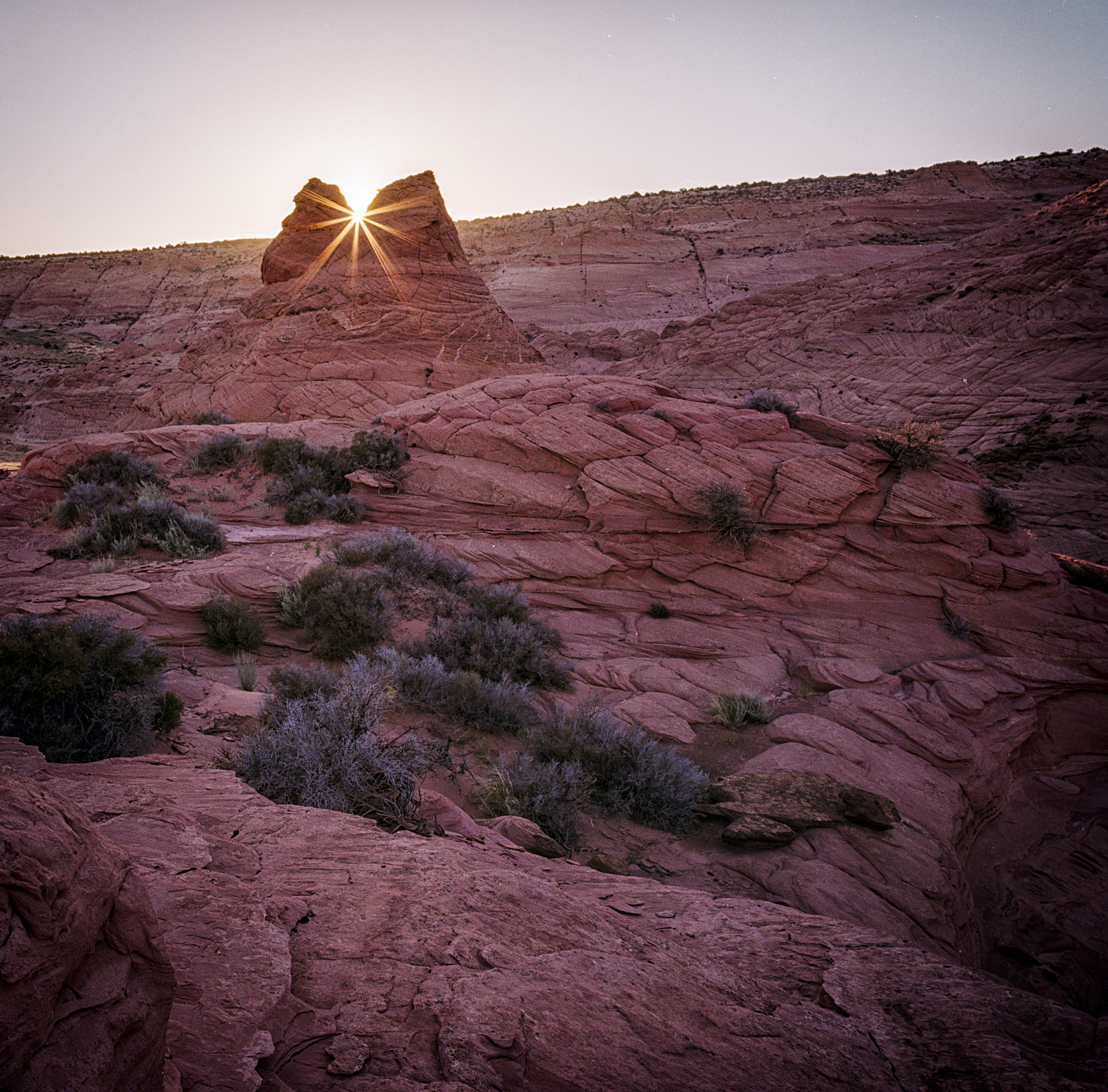 Buckskin Gulch, Utah. I had to move around a bit in order to follow the sun as it rose in order to get it smack dab in the center of the crook in the rock. Again, timing was all important as I had just a few seconds to get it.