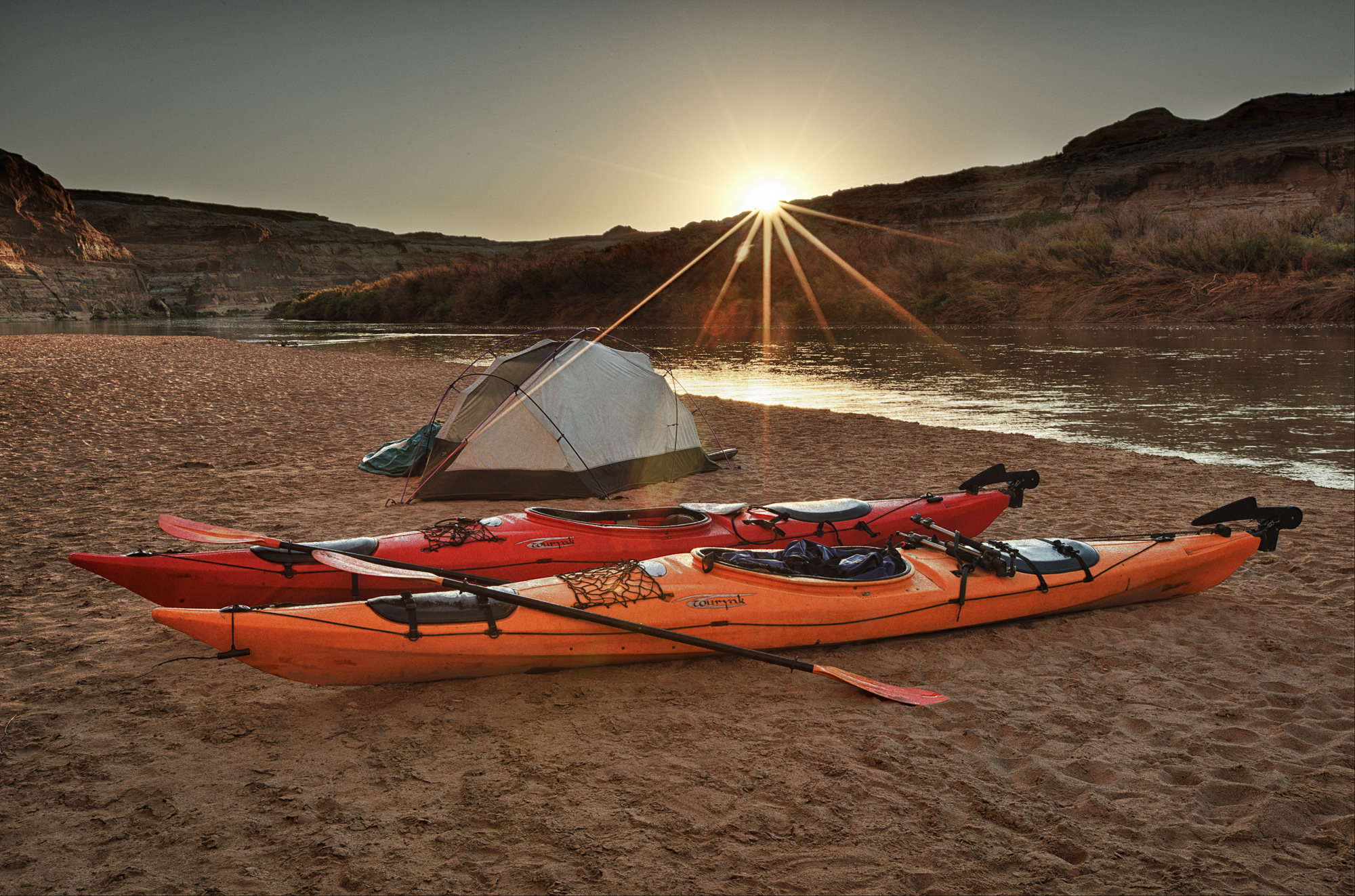 Kayak camp on the Green River, Colorado. This was two different exposures blended together in Photoshop. A tricky shot because I had just a few seconds to nail it before the sun rose above rocks.