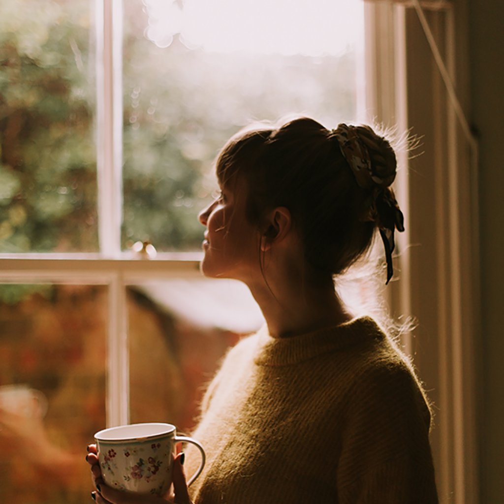 girl holding cup